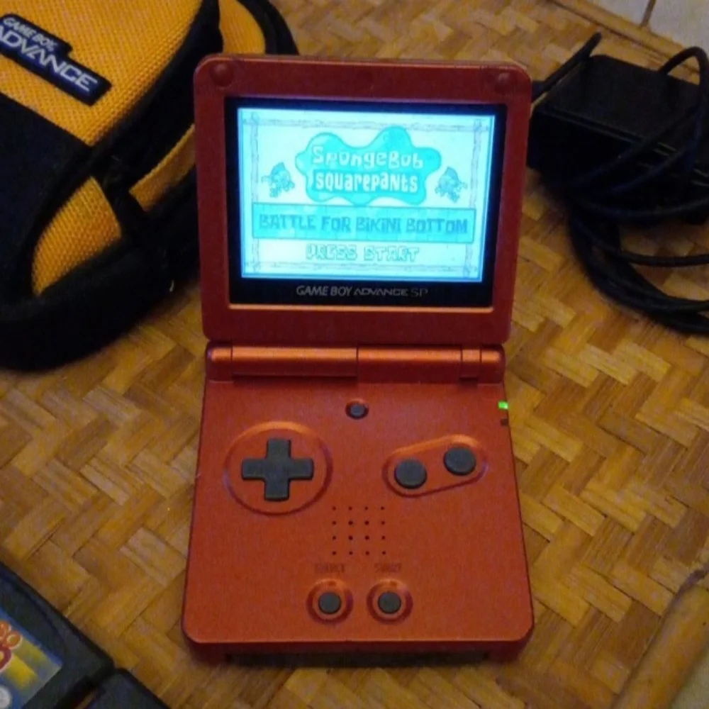 Nintendo Game Boy Advance SP w/10 Games, Charger and Carrying Case 2002